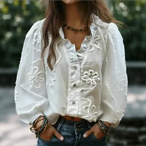 Bohemian white V-neck blouse with floral embroidery and elegant puff sleeves for women