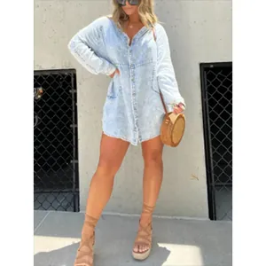Full-length shot of a stylish V-neck acid wash denim shirt dress worn by a model