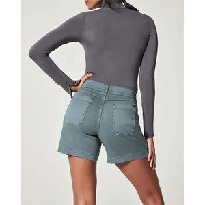 Rear view of women's stretch twill denim shorts in a vintage teal gray finish