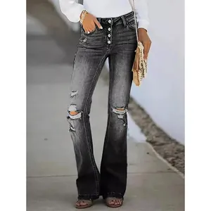 Jeans svasati neri lavati con vita alta a bottoni multipli e strappi sulle ginocchia