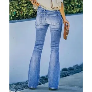 Jeans a zampa retrò a vita alta da donna con lavaggio vintage, vista posteriore elegante
