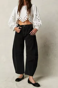 Stylish black wide-leg baggy denim jeans for women with a relaxed mid-low waist fit.
