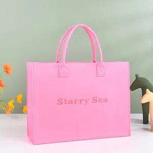 Detaillierte Ansicht der rosa Filz-Einkaufstasche mit Starry Sea Aufdruck
