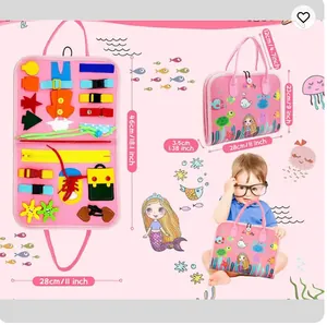 Pink felt Montessori busy board toy with mermaid theme showing dimensions 28x23x3.5cm