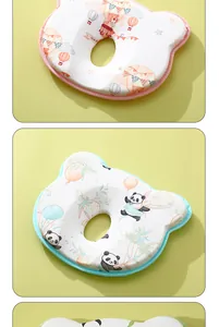 Vista detallada de almohadas de silicona para bebés con estampados de oso y panda