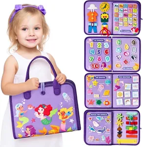 Detailed view of the multi-functional felt busy board showing alphabet and animal sections.