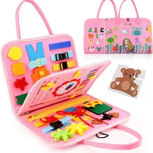 Pink felt busy board for toddlers, educational sensory toy bag with zippers and buckles