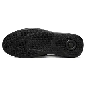 Close-up macro view of the textured anti-slip black rubber sole for men's brogue leather shoes