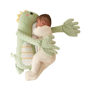 Grünes Dinosaurier Baby-Beruhigungskissen mit Armen gegen Erschrecken beim Schlafen