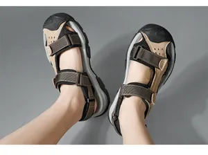 Top-down view of men's leather closed-toe outdoor sandals with mesh panels.