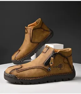 Detalle de botas Martin de cuero cosidas a mano con cremallera para hombre.