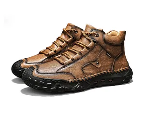 Detailed view of handmade stitched brown leather high-top Martin boots for outdoor wear