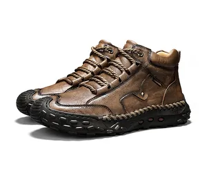 Side view of brown leather Martin boots with hand-stitched detailing and thick rubber sole