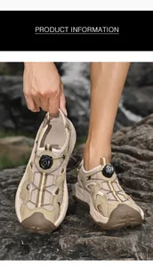 Close-up of men's outdoor sandals with a quick-adjust rotary dial on rugged terrain