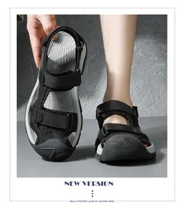 Detail of men's leather outdoor closed-toe sandals with non-slip sole and strap