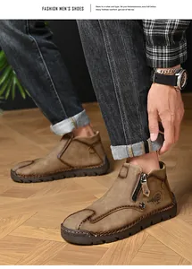 Vista detallada de botas de cuero para hombre cosidas a mano con cremallera y logo