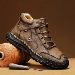Hand-stitched men's high-top leather Martin boots in brown with rugged casual design