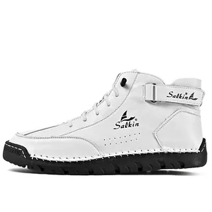 Detailed side view of white high-top leather Martin boots featuring hand-stitched craftsmanship