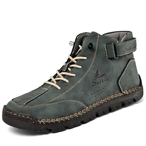 Side view of men's leather Martin boot showing hand-stitched seams and logo detail