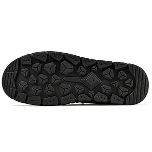Close-up detail of the durable black anti-slip rubber outsole for men's outdoor boots