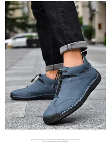 Hand-stitched blue leather mid-top casual shoes with functional zipper details outdoors
