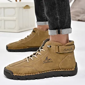 Detailed side view of men's high-top leather Martin boots with handmade stitching