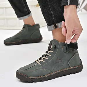 Detail view of men's grey high-top Martin boot showing adjustable ankle Velcro strap