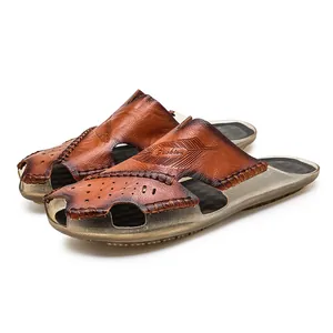Close-up of premium men's leather closed-toe sandals with artistic burnt-edge finish