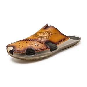 Classic men's brown leather clogs with breathable hollow design and anti-slip sole.