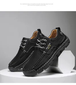 Close-up of black handmade stitched leather casual shoes for men with lace-up design.