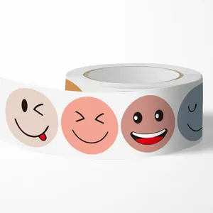 Macro view showing various colorful smiley face emoji stickers on a premium roll.