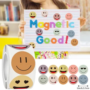 Detailed view of 1-inch colorful smiley face stickers roll with various emoji designs