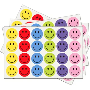 Detailed view of colorful 2.5cm circular smiley face reward stickers for kids and students