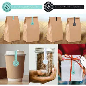 Detail view of handmade sealing stickers on gift bags, coffee cups and glass jars