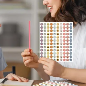 Close-up of vibrant colorful smiley face stickers for kids reward and diy decoration
