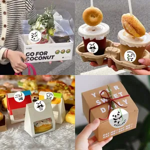 Detailed view of cute panda reward stickers used for gift box and coffee cup sealing