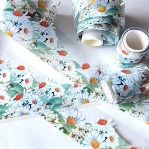 Detailed view of semi-transparent PET tape with realistic white daisy flower patterns