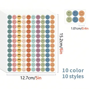 Close-up of 10 styles smiley reward stickers showing 15.2x12.7cm sheet dimensions