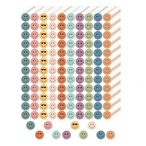 Set of colorful smiley reward stickers with various expressions in retro tones.