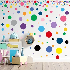 Vinilos decorativos de lunares coloridos en varios tamaños para la habitación infantil