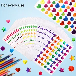 Detailed view of colorful holographic heart and star reward stickers for children.