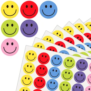 Detailed view of 2.5cm colorful round smiley face stickers used for children reward and crafts