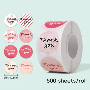 Detail of pink round Thank You stickers roll, 500 labels per roll, 1 inch diameter.