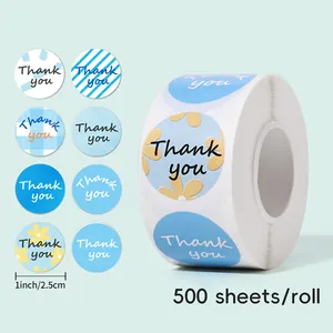 Detail view of 1-inch Thank You sticker roll with 500 floral and striped blue labels
