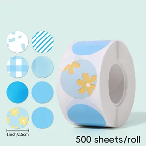 Detail view of blue round sealing stickers with various floral and geometric patterns