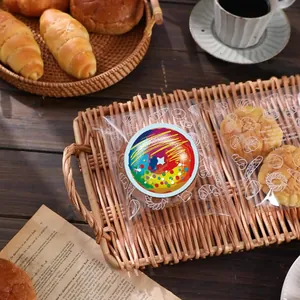 Adesivi colorati a forma di ciambella per sigillare confezioni da forno dolci