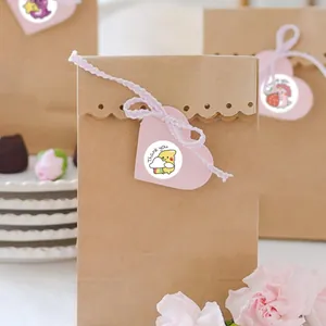Detailed view of cute cartoon animal Thank You stickers on a brown kraft gift bag