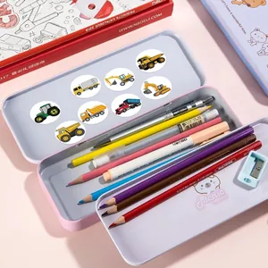 Detailed view of colorful cartoon construction vehicle stickers applied inside a pencil case