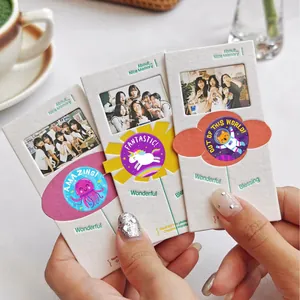 Detailed view of colorful cartoon animal reward stickers used on DIY creative paper frames
