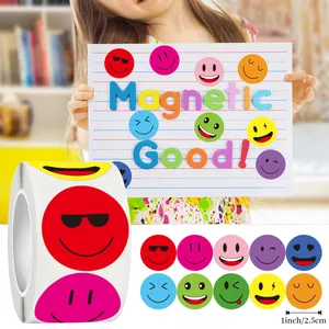 Detail of 500 smiley face reward stickers roll showing 1-inch diameter measurement.
